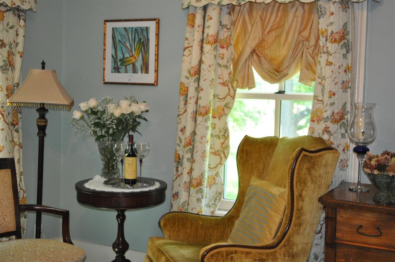 blue-room-with-window-and-chair.jpg